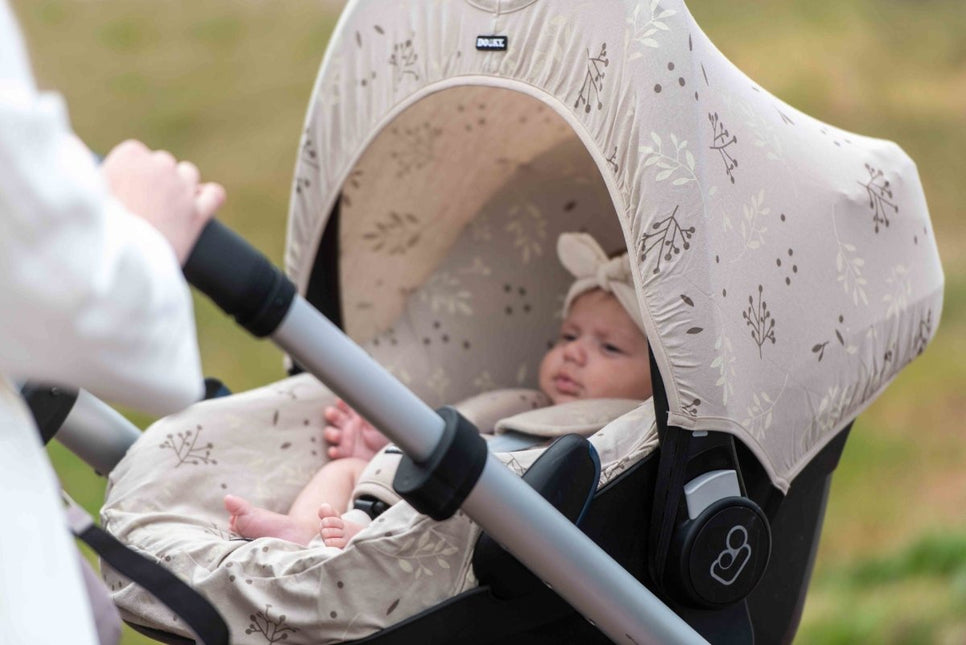 Dooky Zonnekap Hoody Leaves Beige koop je bij Babywinkel
