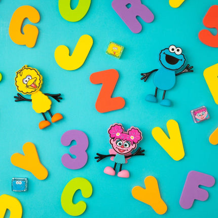 Glopals Badspeelgoed Sensorisch Light - Up Poppetje en Cubes Cookie koop je bij Babywinkel
