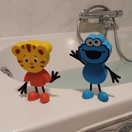Glopals Badspeelgoed Sensorisch Light - Up Poppetje en Cubes Daniel Tiger koop je bij Babywinkel