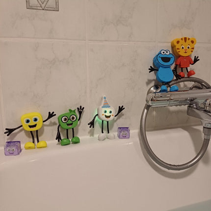 Glopals Badspeelgoed Sensorisch Light - Up Poppetje en Cubes Daniel Tiger koop je bij Babywinkel