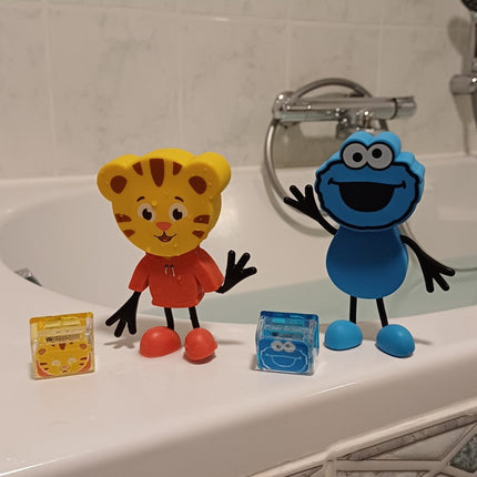 Glopals Badspeelgoed Sensorisch Light - Up Poppetje en Cubes Daniel Tiger koop je bij Babywinkel