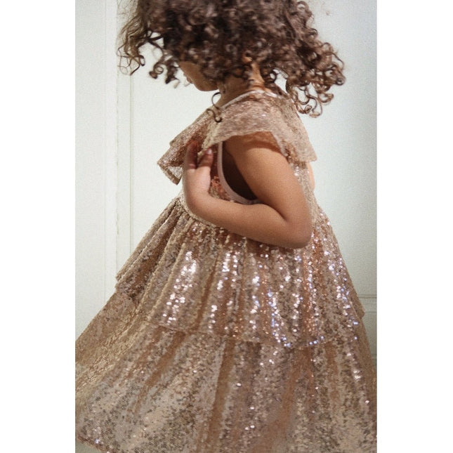 Konges Slojd Baby Jurkje Starla Sequin Gold Blush koop je bij Babywinkel