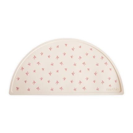 <tc>Mushie</tc> Dækkeservietter med sløjfer i silikone 48 cm
