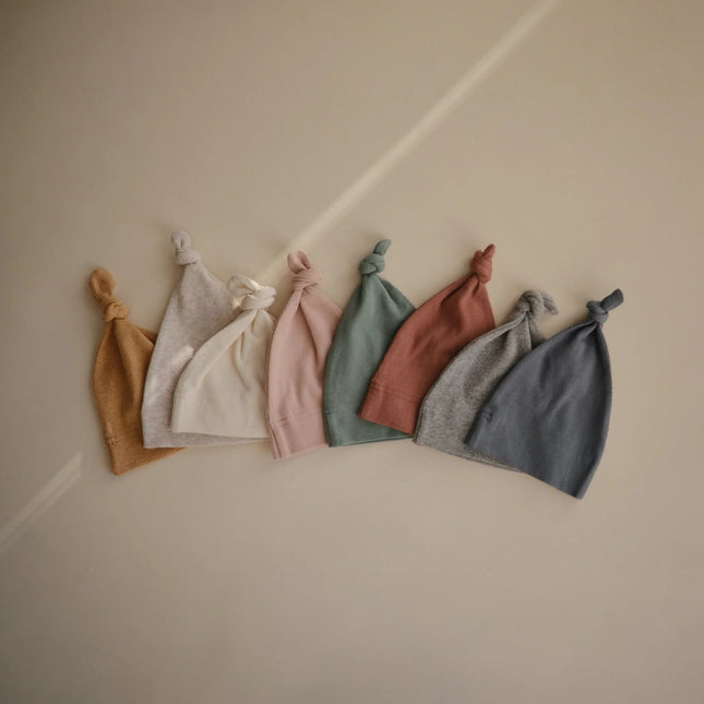 Mushie Babymutsje Mustard Melange koop je bij Babywinkel