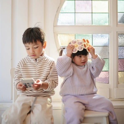 Mushie Educatief Speelgoed Druk Bloem Soft Lilac/Daffodil/Ivory koop je bij Babywinkel