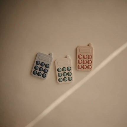 Mushie Educatief Speelgoed Druk Telefoon Blush koop je bij Babywinkel
