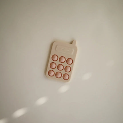 Mushie Educatief Speelgoed Druk Telefoon Blush koop je bij Babywinkel