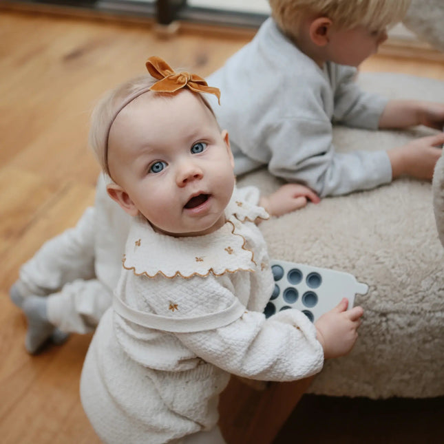 Mushie Educatief Speelgoed Druk Telefoon Tradewinds koop je bij Babywinkel