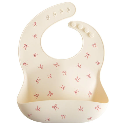Mushie Slabbetje Bows Silicone koop je bij Babywinkel