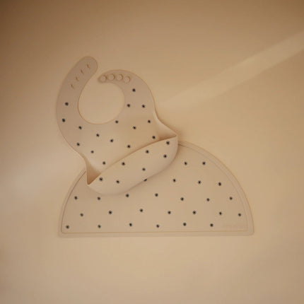 Mushie Slabbetje Black Daisy koop je bij Babywinkel