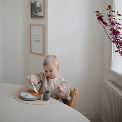 Mushie Slabbetje Lange Mouwen Pastel Blooms koop je bij Babywinkel
