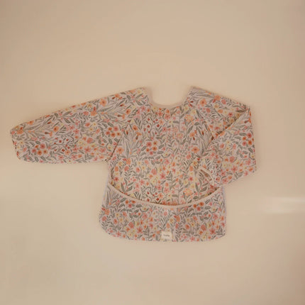 Mushie Slabbetje Lange Mouwen Pastel Blooms koop je bij Babywinkel