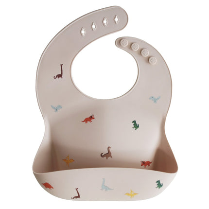 Mushie Slabbetje Silicone Dino koop je bij Babywinkel