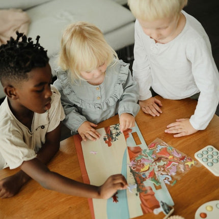 Mushie Stickerboek Dino koop je bij Babywinkel