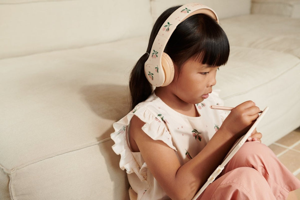 Quinn draadloze hoofdtelefoon Peach / Sea shell koop je bij Babywinkel